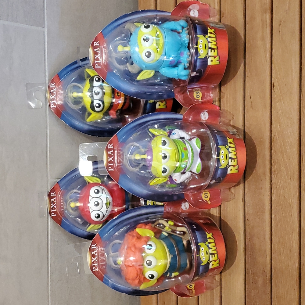 Pixar REMIX Figurines.  Figurines 1 - 5. New, in original packaging.